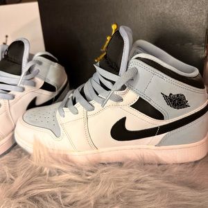Air Jordan high top sneakers women’s baby  blue and black.